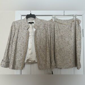 Woman’s dressy TAHARI jacket/skirt suit size12